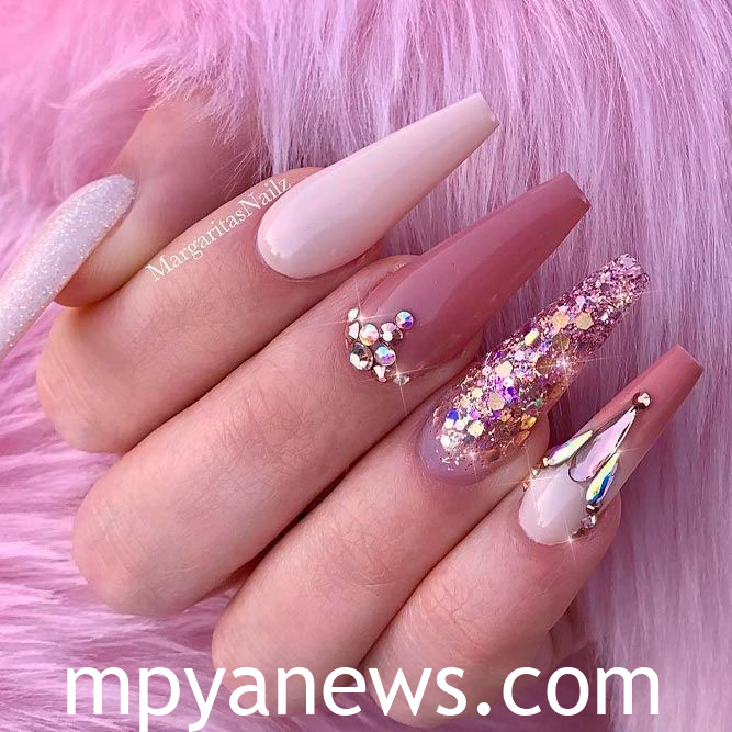 Fall pink nails muted mauve pink with metallic accents