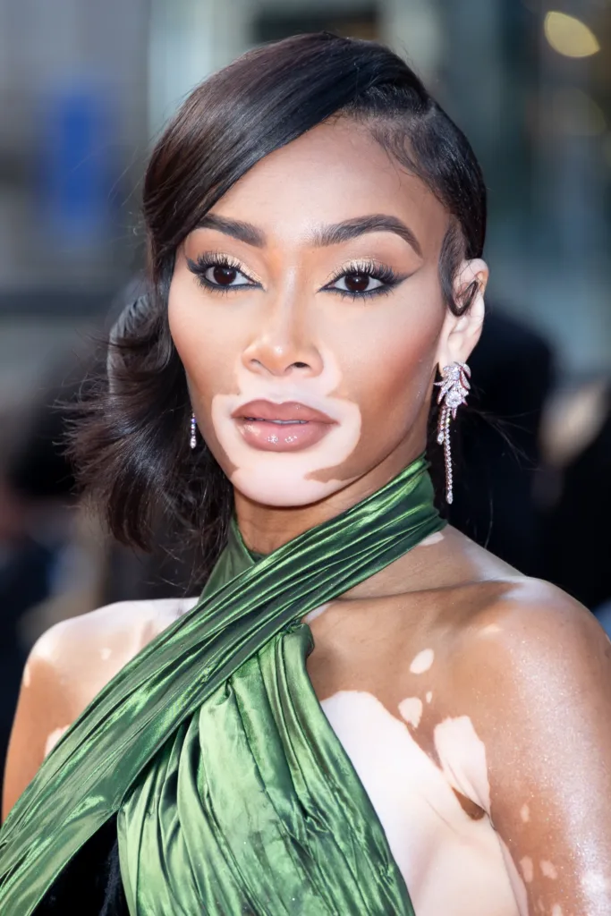 Winnie Harlow in green cloth