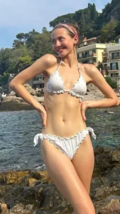 Iris Apatow in a white bikini