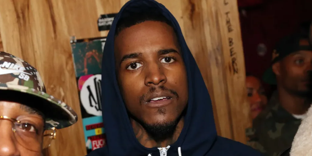 Lil Reese in a black hoodie