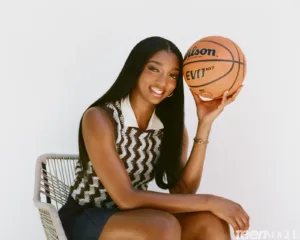 angel Reese with a basketball