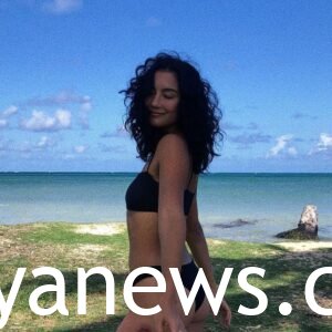 Adeline Rudolph in a black bikini