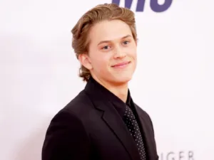 Deacon Reese Phillippe in a black suit