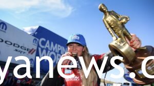 Leah Pruett holding a trophy