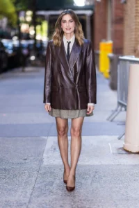 Allison Williams in a leather jacket