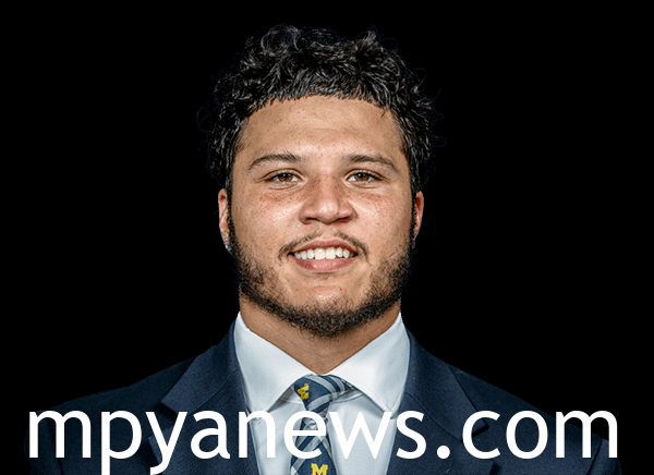 Blake Corum in suit