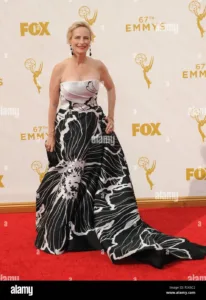 Laila Robins in a black and white gown