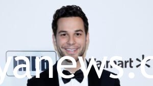 Skylar Astin in a suit