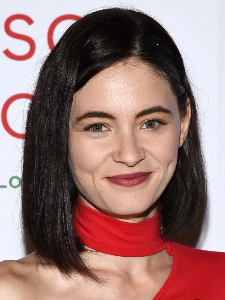 Sandra Mae Frank in red