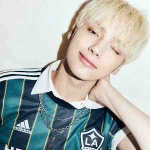 Huening Kai in a white hairstyle