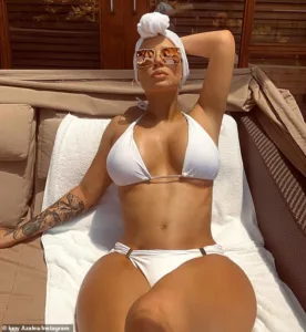 Iggy Azalea in a white bikini