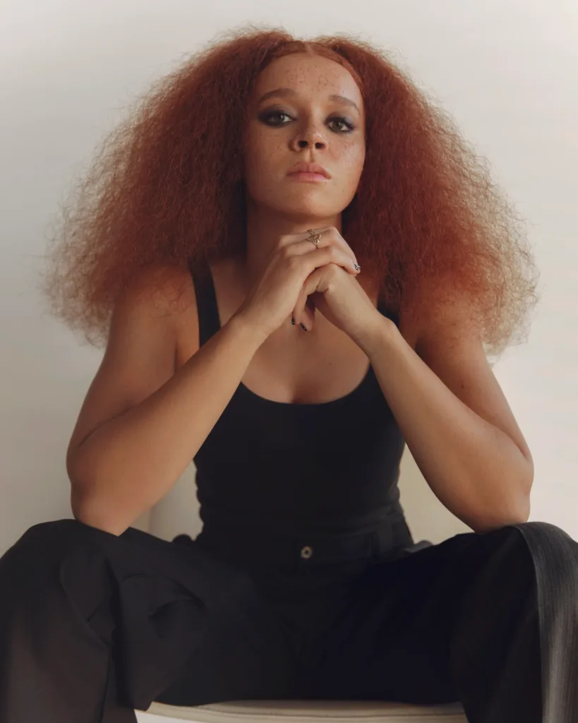 Erin Kellyman in black