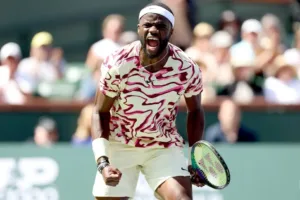  Frances Tiafoe playing tennis