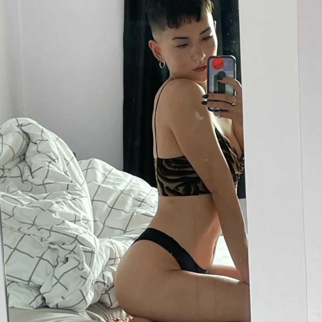 Jessie Mei Li in a black bikini
