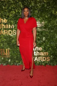Janelle James in a red gown