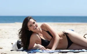 Katie Lee in a black bikini