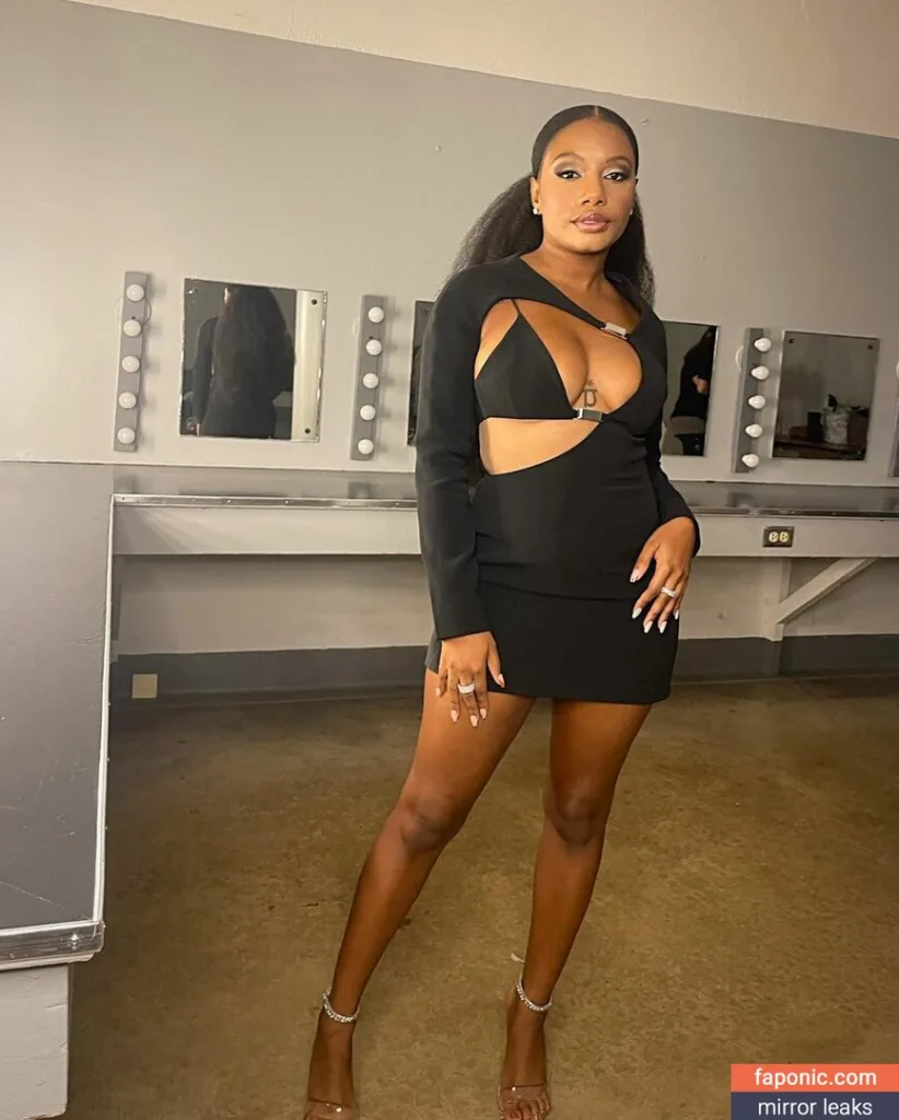 Imani Hakim in black