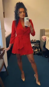 Joy Taylor in red
