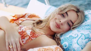 Sabrina Carpenter in a colorful bikini