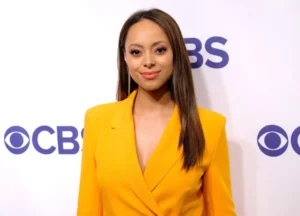 Amber Stevens West in a power suit