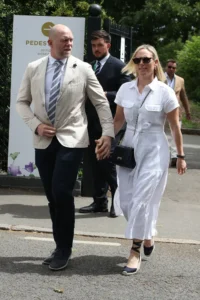 Zara Tindall: on a white dress,black glassses with mike