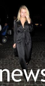 Lottie Moss in a black jumpsuit