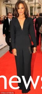 Lenora Crichlow in a black Jumpsuit