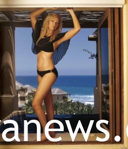Laura Prepon in a black bikini