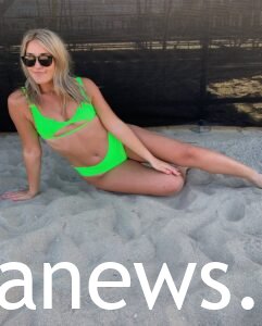 Madison Thompson in a green bikini