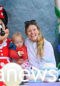 Mia Goth and her child