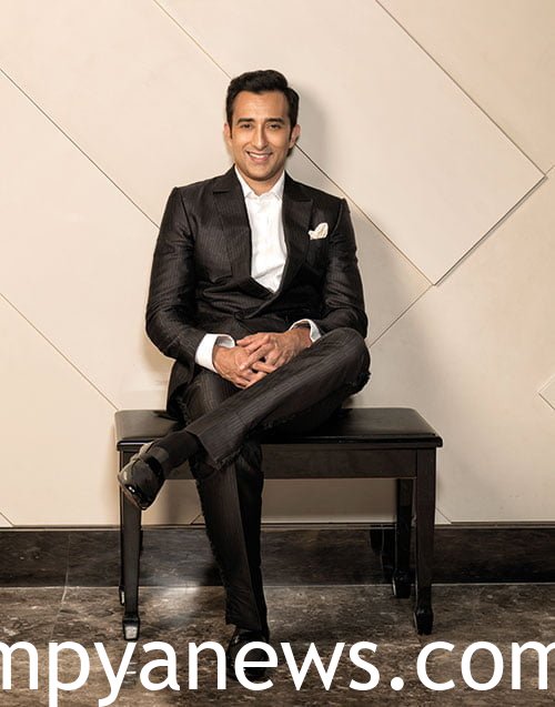 Rahul Khanna in a classic black suit