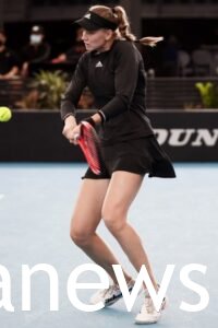 Elena Rybakina in black tennis skirt