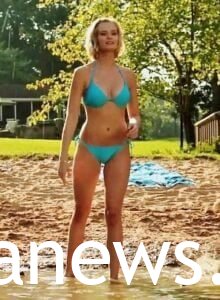 Sara Paxton in a blue bikini