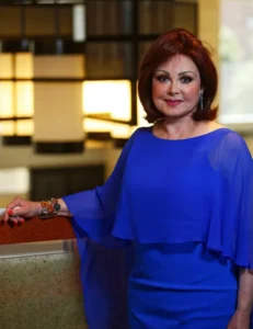 Naomi Judd in blue