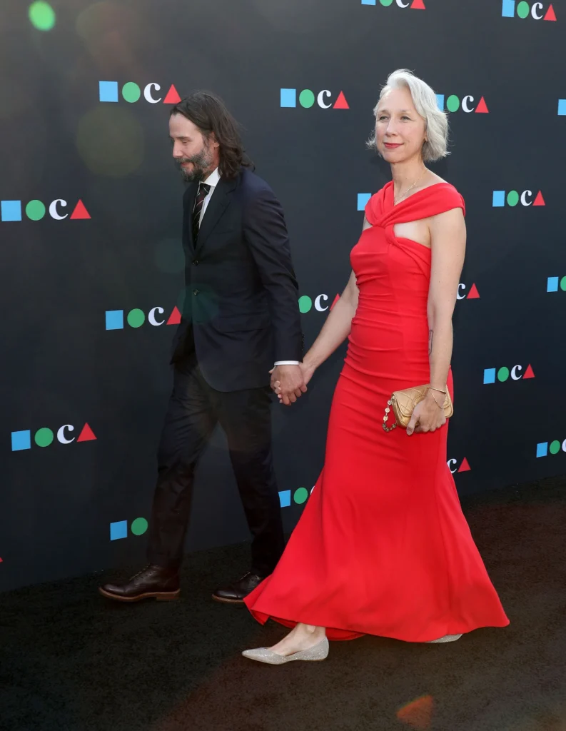 Alexandra Grant in a red dress