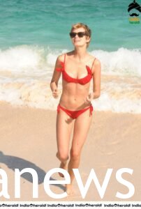 Sara Paxton in a red bikini