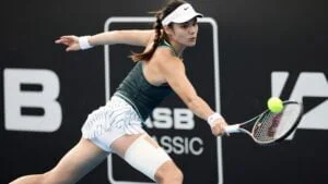 Emma Raducanu playing tennis 