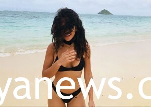 Adria Arjona in a black bikini