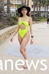Chiara Aurelia in a yellow swimsuit