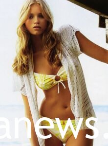 Abbey Lee in a yellow bikini
