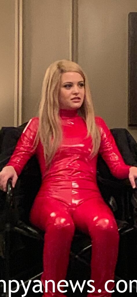 Sara Waisglass in a red pantsuit