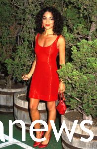 Jasmine Guy in red