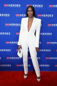 Naomi Campbell: in a white pantsuit