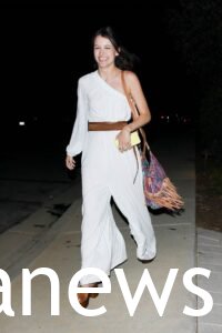 Sara Waisglass in a white pantsuit