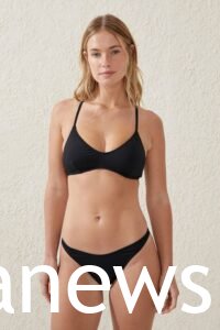 Margot Robbie in a black bikini