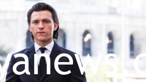 Tom Holland black suit