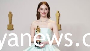 Emma Stone with her white ensemble