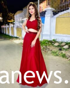 Arishfa Khan in a red gown