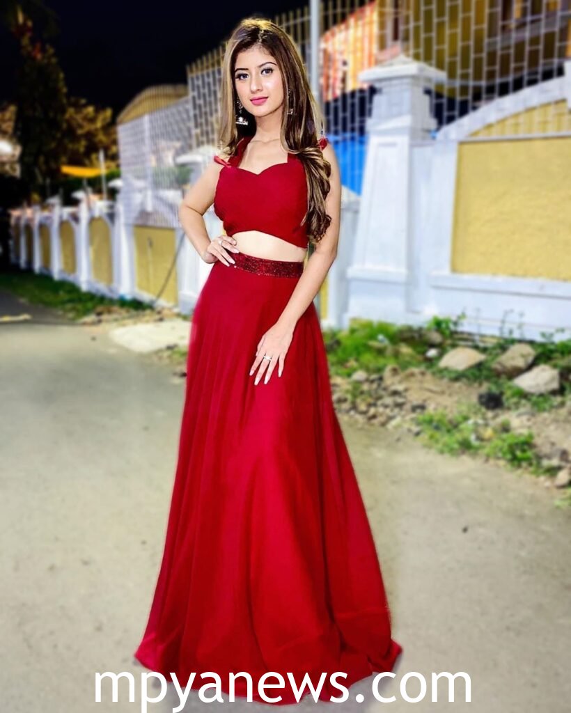 Arishfa Khan in a red gown
