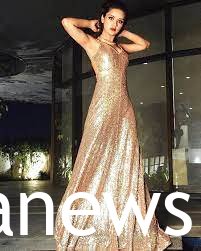 Avneet Kaur in a gold gown 